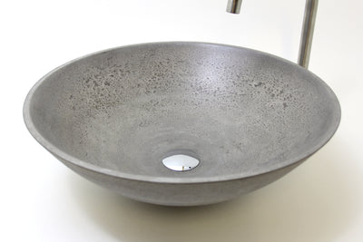 A ROC Products Concrete basin A subtle yet beautiful concrete basin in an elegant light grey that has a striking 'moon crater' like appearance on the inner surface and a simple sand textured outer. Approx. size - Dia. 500mm  H. 170mm.