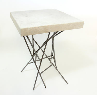 ROC products concrete lattice side table top in two colours of off white gfrc concrete with welded steel legs set in a random random lattice design